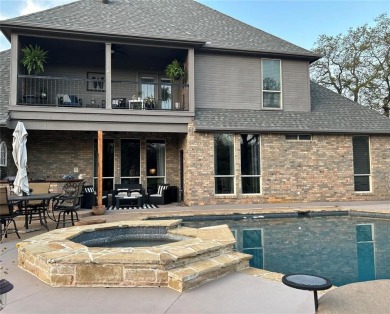 Indulge in luxury living with this one of a kind custom built on Sugar Tree Golf and Country Club in Texas - for sale on GolfHomes.com, golf home, golf lot