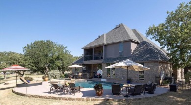 Indulge in luxury living with this one of a kind custom built on Sugar Tree Golf and Country Club in Texas - for sale on GolfHomes.com, golf home, golf lot