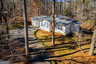 A charming 2-bedroom, 2-bath home tucked away on a quiet on Fairfield Plantation Golf and Country Club in Georgia - for sale on GolfHomes.com, golf home, golf lot