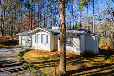 A charming 2-bedroom, 2-bath home tucked away on a quiet on Fairfield Plantation Golf and Country Club in Georgia - for sale on GolfHomes.com, golf home, golf lot