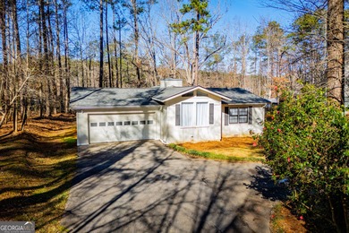 A charming 2-bedroom, 2-bath home tucked away on a quiet on Fairfield Plantation Golf and Country Club in Georgia - for sale on GolfHomes.com, golf home, golf lot