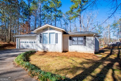 A charming 2-bedroom, 2-bath home tucked away on a quiet on Fairfield Plantation Golf and Country Club in Georgia - for sale on GolfHomes.com, golf home, golf lot