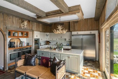 Discover extraordinary craftsmanship and authentic architecture on Birchwood Farms Golf and Country Club in Michigan - for sale on GolfHomes.com, golf home, golf lot
