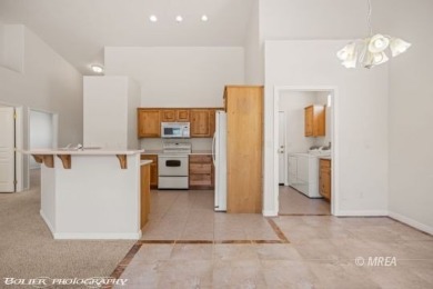 Welcome to this exceptionally clean and well-maintained townhome on Wolf Creek At Paradise Canyon in Nevada - for sale on GolfHomes.com, golf home, golf lot
