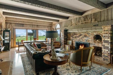 Discover extraordinary craftsmanship and authentic architecture on Birchwood Farms Golf and Country Club in Michigan - for sale on GolfHomes.com, golf home, golf lot