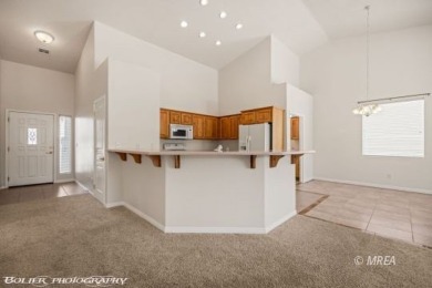 Welcome to this exceptionally clean and well-maintained townhome on Wolf Creek At Paradise Canyon in Nevada - for sale on GolfHomes.com, golf home, golf lot
