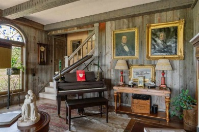Discover extraordinary craftsmanship and authentic architecture on Birchwood Farms Golf and Country Club in Michigan - for sale on GolfHomes.com, golf home, golf lot