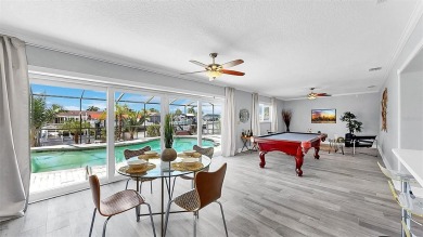 Waterfront luxury in Apollo Beach with no HOA, no CDD, and on Apollo Beach Golf and Sea Club in Florida - for sale on GolfHomes.com, golf home, golf lot