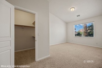 Welcome to this exceptionally clean and well-maintained townhome on Wolf Creek At Paradise Canyon in Nevada - for sale on GolfHomes.com, golf home, golf lot