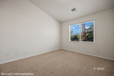 Welcome to this exceptionally clean and well-maintained townhome on Wolf Creek At Paradise Canyon in Nevada - for sale on GolfHomes.com, golf home, golf lot