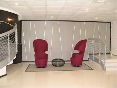 Enjoy beachfront living in the heart of Mid Beach. This 1 on La Gorce Country Club in Florida - for sale on GolfHomes.com, golf home, golf lot