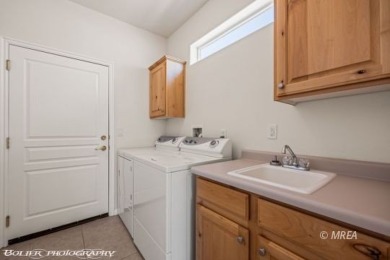 Welcome to this exceptionally clean and well-maintained townhome on Wolf Creek At Paradise Canyon in Nevada - for sale on GolfHomes.com, golf home, golf lot