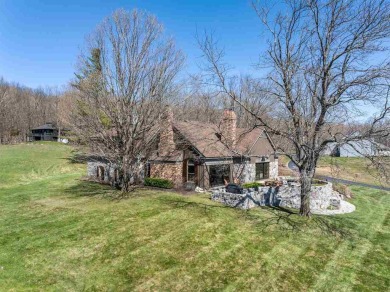 Discover extraordinary craftsmanship and authentic architecture on Birchwood Farms Golf and Country Club in Michigan - for sale on GolfHomes.com, golf home, golf lot
