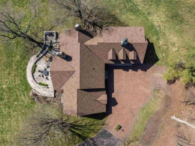 Discover extraordinary craftsmanship and authentic architecture on Birchwood Farms Golf and Country Club in Michigan - for sale on GolfHomes.com, golf home, golf lot
