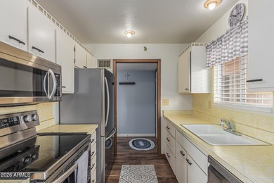 Welcome to this charming Sun City home featuring 2 spacious on PalmBrook Country Club in Arizona - for sale on GolfHomes.com, golf home, golf lot