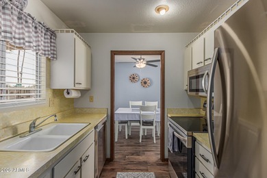 Welcome to this charming Sun City home featuring 2 spacious on PalmBrook Country Club in Arizona - for sale on GolfHomes.com, golf home, golf lot