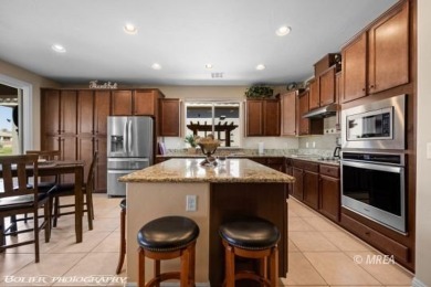 Stunning 2-bedroom + den home located on the 5th hole of the on The Oasis Golf Club in Nevada - for sale on GolfHomes.com, golf home, golf lot