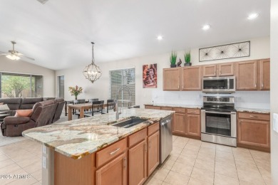 Charming single-level home in a community loaded with on Las Colinas Golf Club in Arizona - for sale on GolfHomes.com, golf home, golf lot