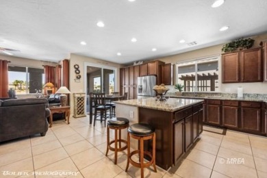 Stunning 2-bedroom + den home located on the 5th hole of the on The Oasis Golf Club in Nevada - for sale on GolfHomes.com, golf home, golf lot