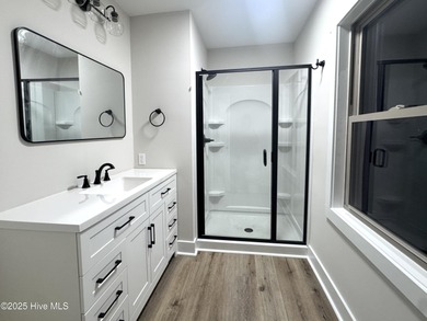 GOLF FRONT! COMPLETELY REMODELED! This stunning 3-bedroom on Seven Lakes Country Club in North Carolina - for sale on GolfHomes.com, golf home, golf lot