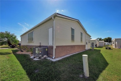 Welcome home to 476 Bimini Dr in award winning Port Charlotte on Kings Gate Golf Club in Florida - for sale on GolfHomes.com, golf home, golf lot