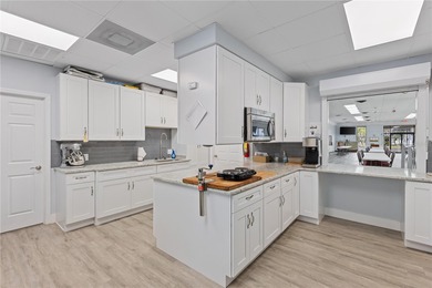 Welcome to this beautifully maintained 2-bedroom, 2-bath on Kings Gate Golf Club in Florida - for sale on GolfHomes.com, golf home, golf lot