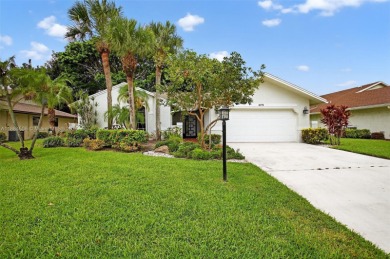 Beautiful two bedroom two and half bath single family home in on Boca Delray Golf and Country Club in Florida - for sale on GolfHomes.com, golf home, golf lot