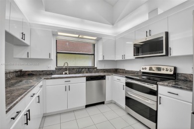 Beautiful two bedroom two and half bath single family home in on Boca Delray Golf and Country Club in Florida - for sale on GolfHomes.com, golf home, golf lot