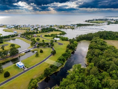 Waterfront lot on pristine pond in natural setting in Bay on Bay Creek Golf Club in Virginia - for sale on GolfHomes.com, golf home, golf lot