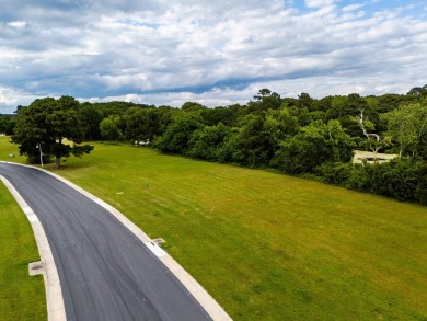 Waterfront lot on pristine pond in natural setting in Bay on Bay Creek Golf Club in Virginia - for sale on GolfHomes.com, golf home, golf lot