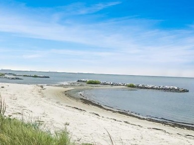 Waterfront lot on pristine pond in natural setting in Bay on Bay Creek Golf Club in Virginia - for sale on GolfHomes.com, golf home, golf lot