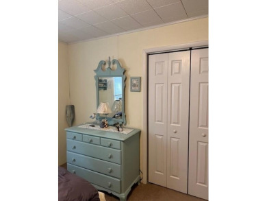Cozy cottage with open floor plan and beachy feel.  Fully on Captains Cove Golf and Yacht Club in Virginia - for sale on GolfHomes.com, golf home, golf lot