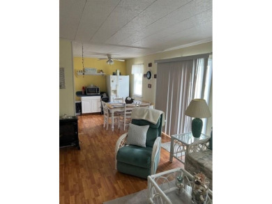 Cozy cottage with open floor plan and beachy feel.  Fully on Captains Cove Golf and Yacht Club in Virginia - for sale on GolfHomes.com, golf home, golf lot
