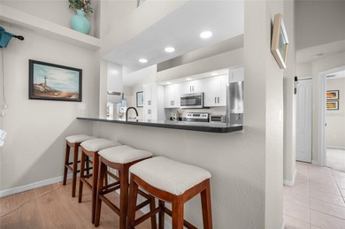 Step into refreshed Florida living in this beautifully updated on Pinemoor West Golf Club in Florida - for sale on GolfHomes.com, golf home, golf lot