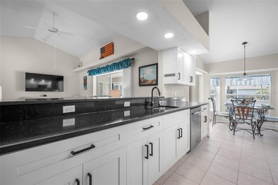 Step into refreshed Florida living in this beautifully updated on Pinemoor West Golf Club in Florida - for sale on GolfHomes.com, golf home, golf lot