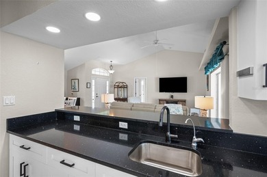 Step into refreshed Florida living in this beautifully updated on Pinemoor West Golf Club in Florida - for sale on GolfHomes.com, golf home, golf lot