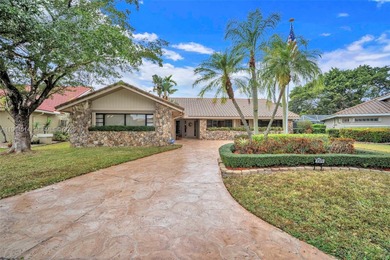 Enjoy the lifestyle of country club living in the friendly on Woodmont Country Club in Florida - for sale on GolfHomes.com, golf home, golf lot