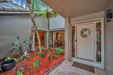 Enjoy the lifestyle of country club living in the friendly on Woodmont Country Club in Florida - for sale on GolfHomes.com, golf home, golf lot