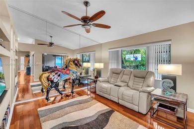 Enjoy the lifestyle of country club living in the friendly on Woodmont Country Club in Florida - for sale on GolfHomes.com, golf home, golf lot