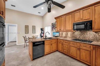 Enjoy the lifestyle of country club living in the friendly on Woodmont Country Club in Florida - for sale on GolfHomes.com, golf home, golf lot