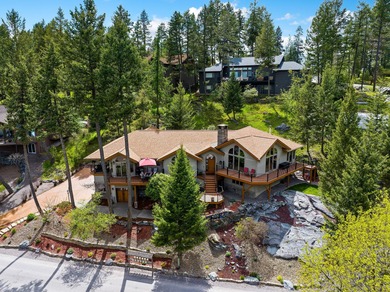 If you want beautiful Swan Mountain views from almost every room on  in Montana - for sale on GolfHomes.com, golf home, golf lot