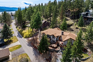 If you want beautiful Swan Mountain views from almost every room on  in Montana - for sale on GolfHomes.com, golf home, golf lot