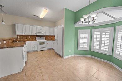 Welcome to this bright and inviting home located in the Reeds on Long Bay Club in South Carolina - for sale on GolfHomes.com, golf home, golf lot