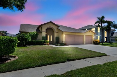 Welcome to your dream home in the exclusive gated community of on East Lake Woodlands Country Club in Florida - for sale on GolfHomes.com, golf home, golf lot