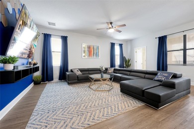 This exceptional ChampionsGate Retreat POOL home showcases on The Oasis Club at Champions Gate in Florida - for sale on GolfHomes.com, golf home, golf lot