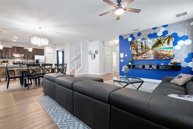 This exceptional ChampionsGate Retreat POOL home showcases on The Oasis Club at Champions Gate in Florida - for sale on GolfHomes.com, golf home, golf lot