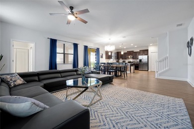 This exceptional ChampionsGate Retreat POOL home showcases on The Oasis Club at Champions Gate in Florida - for sale on GolfHomes.com, golf home, golf lot