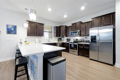 This exceptional ChampionsGate Retreat POOL home showcases on The Oasis Club at Champions Gate in Florida - for sale on GolfHomes.com, golf home, golf lot