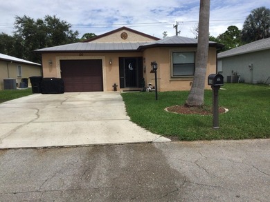 Nicely maintained concrete block home in the much sought after on Spanish Lakes I in Florida - for sale on GolfHomes.com, golf home, golf lot