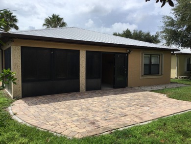 Nicely maintained concrete block home in the much sought after on Spanish Lakes I in Florida - for sale on GolfHomes.com, golf home, golf lot